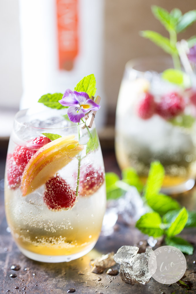 Just peachy Champagne Spritzer. Find best 55 summer cocktails for parties and fun. Delicious refreshing summer drink to quench your thirst. 