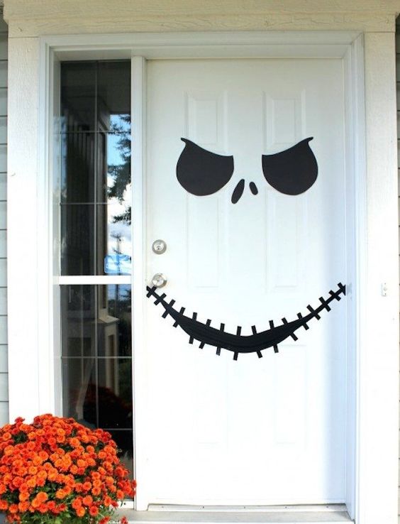 Try some spooky Halloween face sticker door decorations. Find more Halloween door decoration ideas. Halloween front door decorations. 