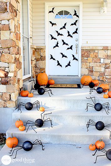 Spider and bats door decoration. Find more Halloween door decoration ideas. Halloween outdoor decorating ideas. 