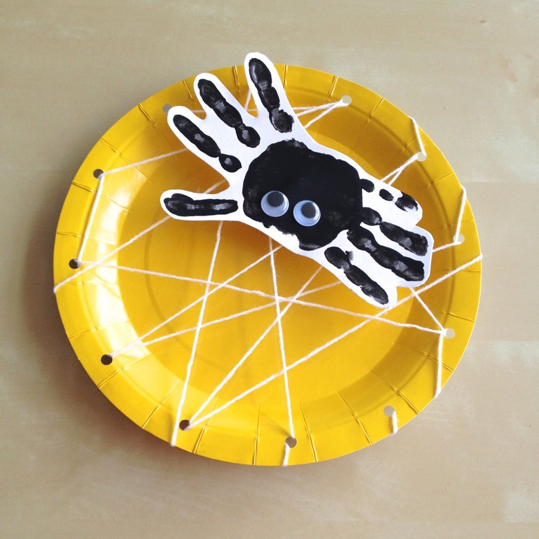 Create your own spider webs using hole-punched paper plates and yarn on Halloween. Try 15 more simple and easy crafts ideas for kids to decorate party and enjoy evening. 
