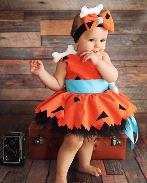 Dress up your baby girl with this Flintstones costume for Halloween celebrations. Get more Halloween kids costumes ideas to boom that day.